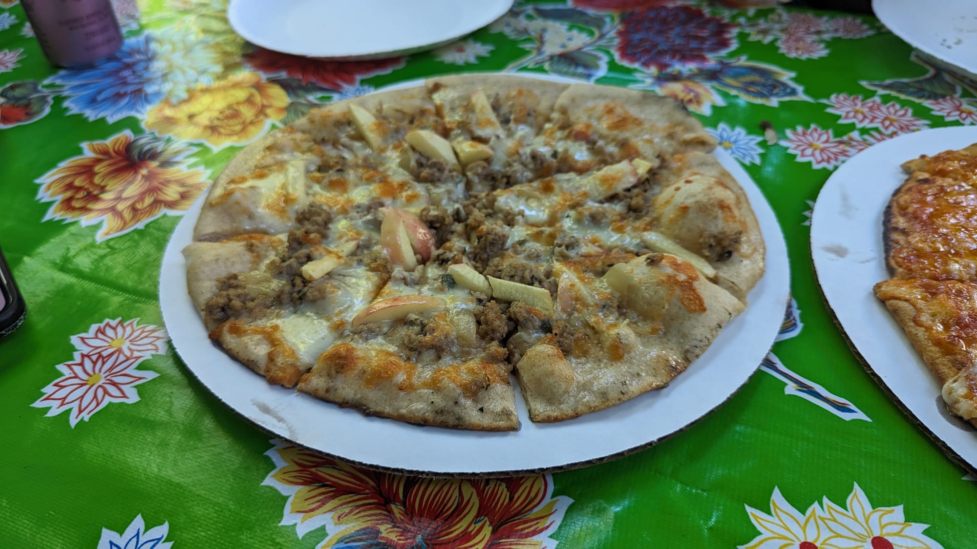 photo of sausage and apple pizza