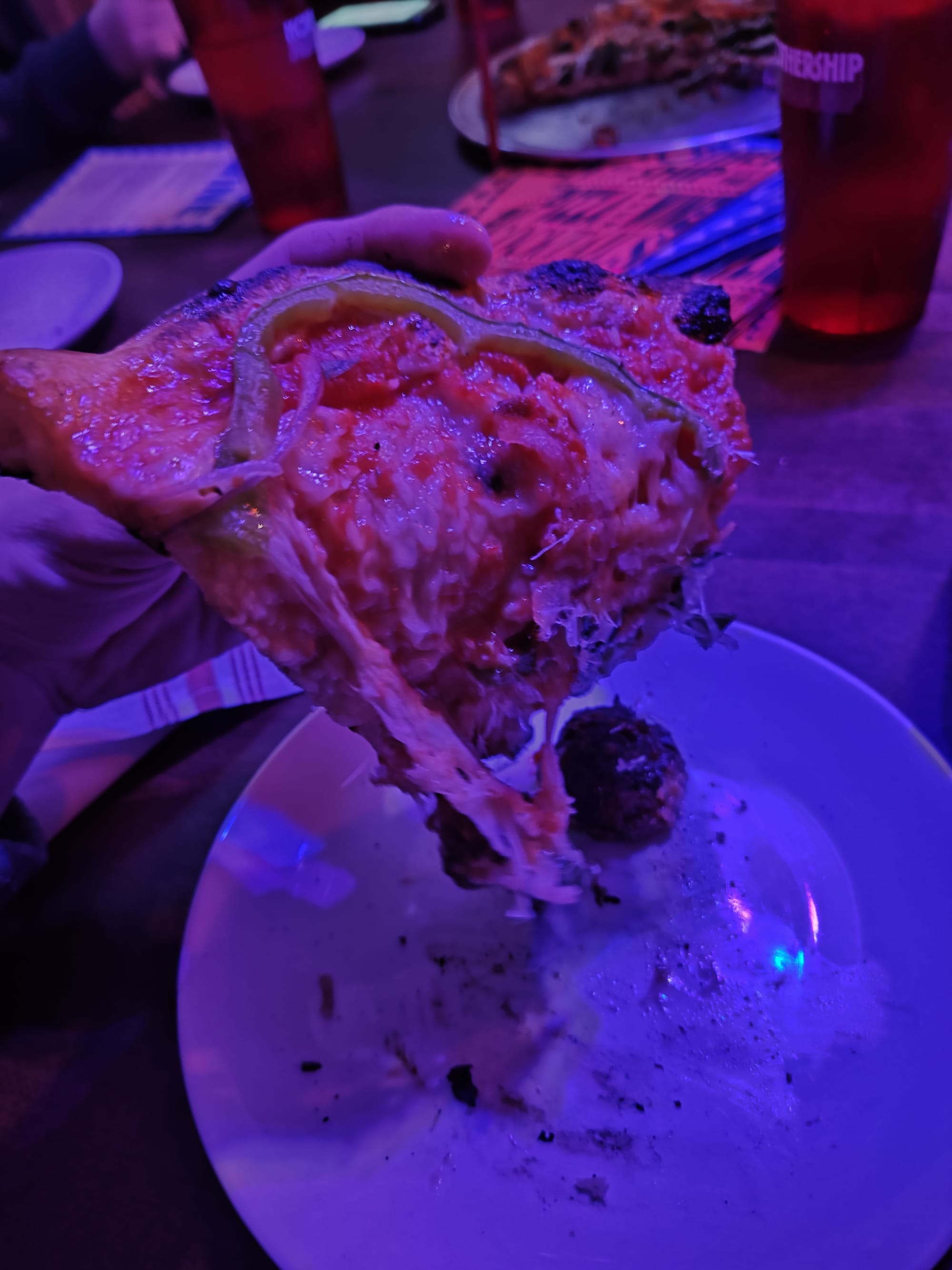 pizza with toppings that have fallen off