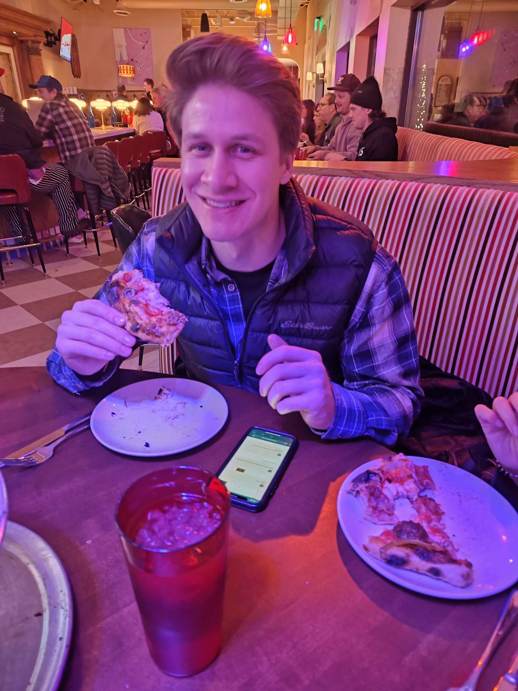 man holding pizza